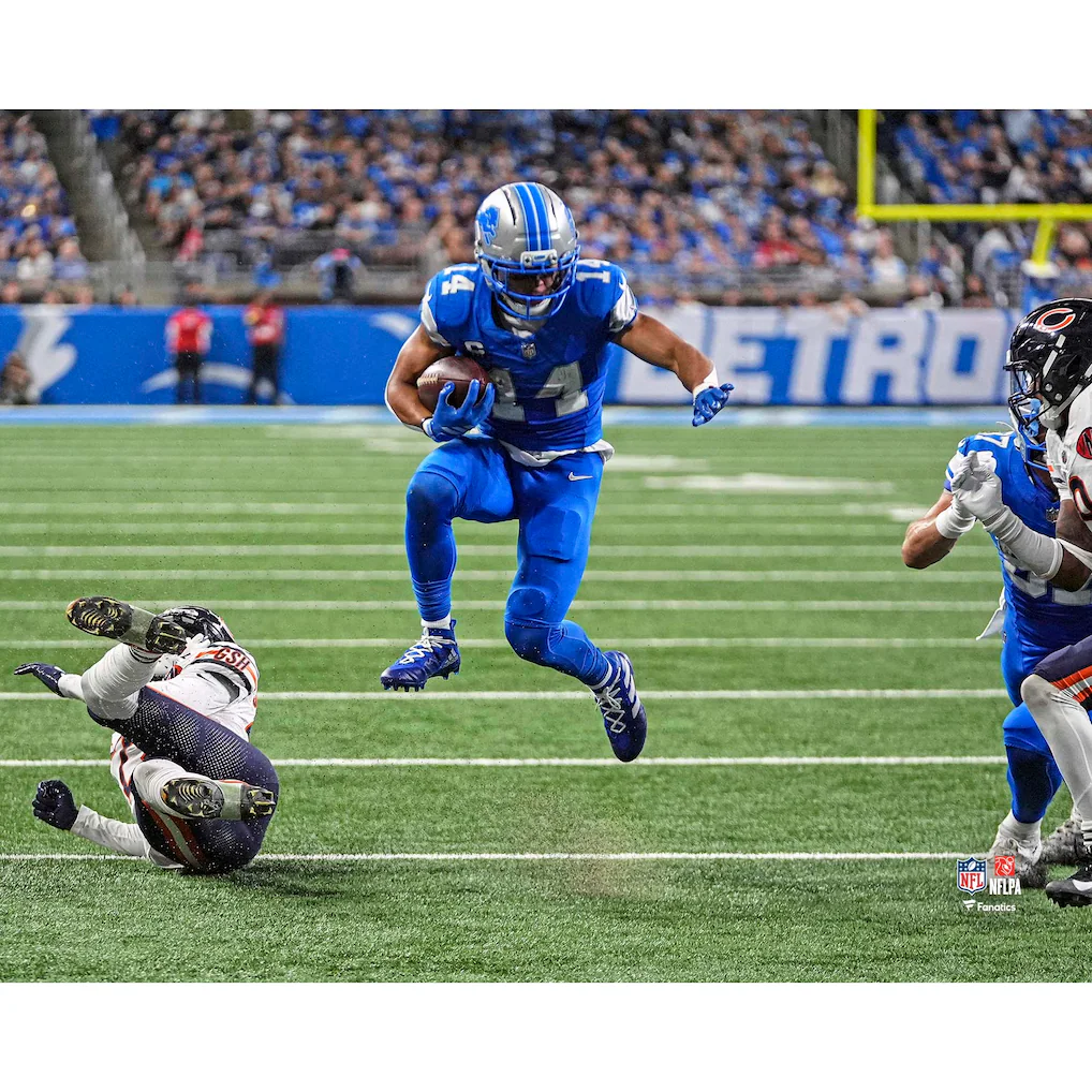 Amon-Ra St. Brown Detroit Lions Unsigned Fanatics Authentic 2025 Week 2 Hurdle Touchdown Photograph
