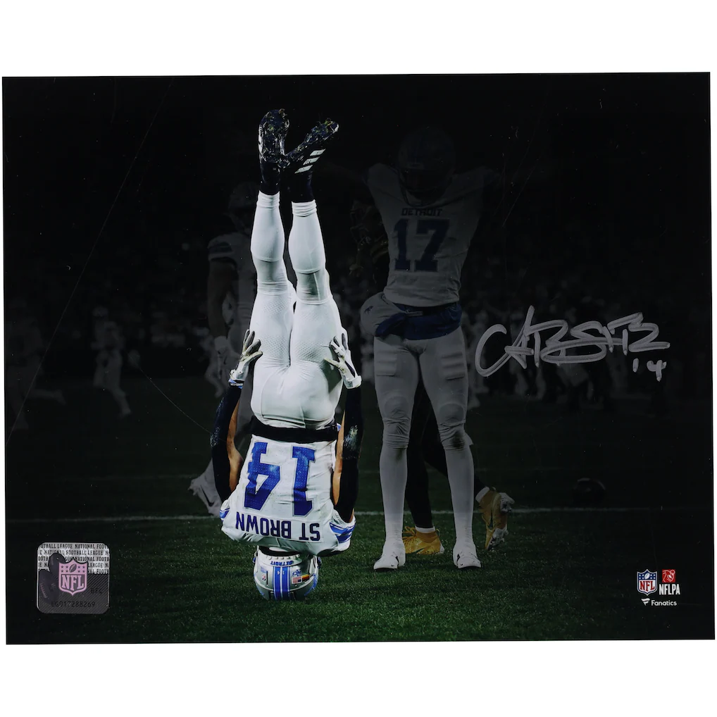 Amon-Ra St. Brown Detroit Lions Autographed Fanatics Authentic 8" x 10" Head Stand Celebration Spotlight Photograph